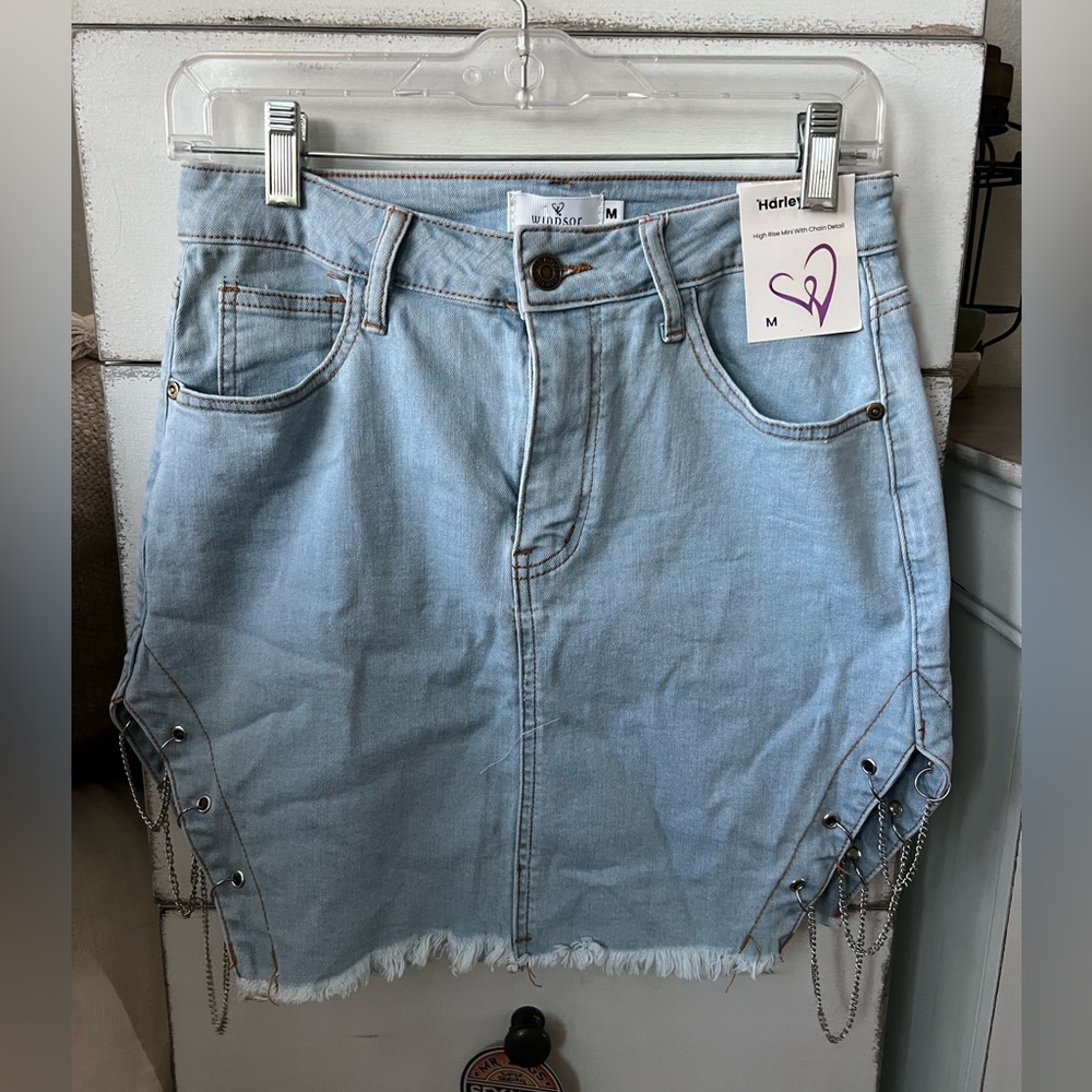 Windsor jean mini skirt with chain accent. Size medium.